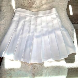 American Apparel white tennis skirt in small with stain